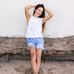 This tank is made with organic cotton. Featuring a hand stamped lettering unique to each tee. This tank is completely plant based and safe on your skin and our planet. This tank comes pre-cut at the hem for the perfect length, hitting right at your waistline. For ultimate comfort and added softness this tank gets better with each wear.  Hand Stamped  Slightly Cropped - Perfect for high-waisted bottoms, also can be tucked in  Raw Hemline, Relaxed Fit  Model is wearing size medium